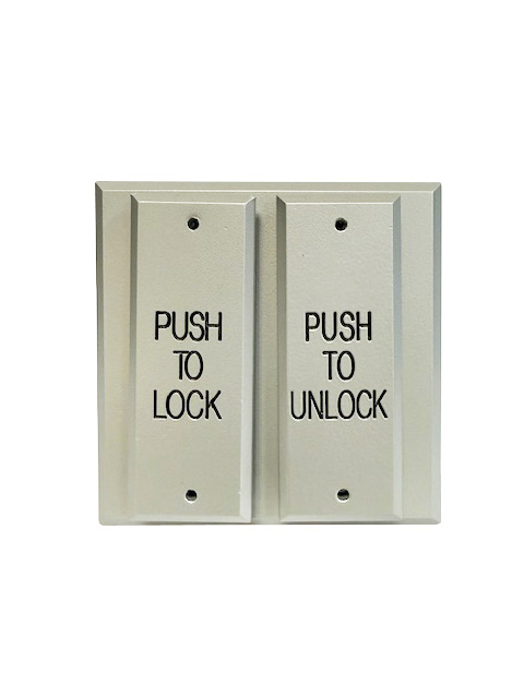 Metal wall plate with two rectangular push buttons labeled 'Push to Lock' on the left and 'Push to Unlock' on the right