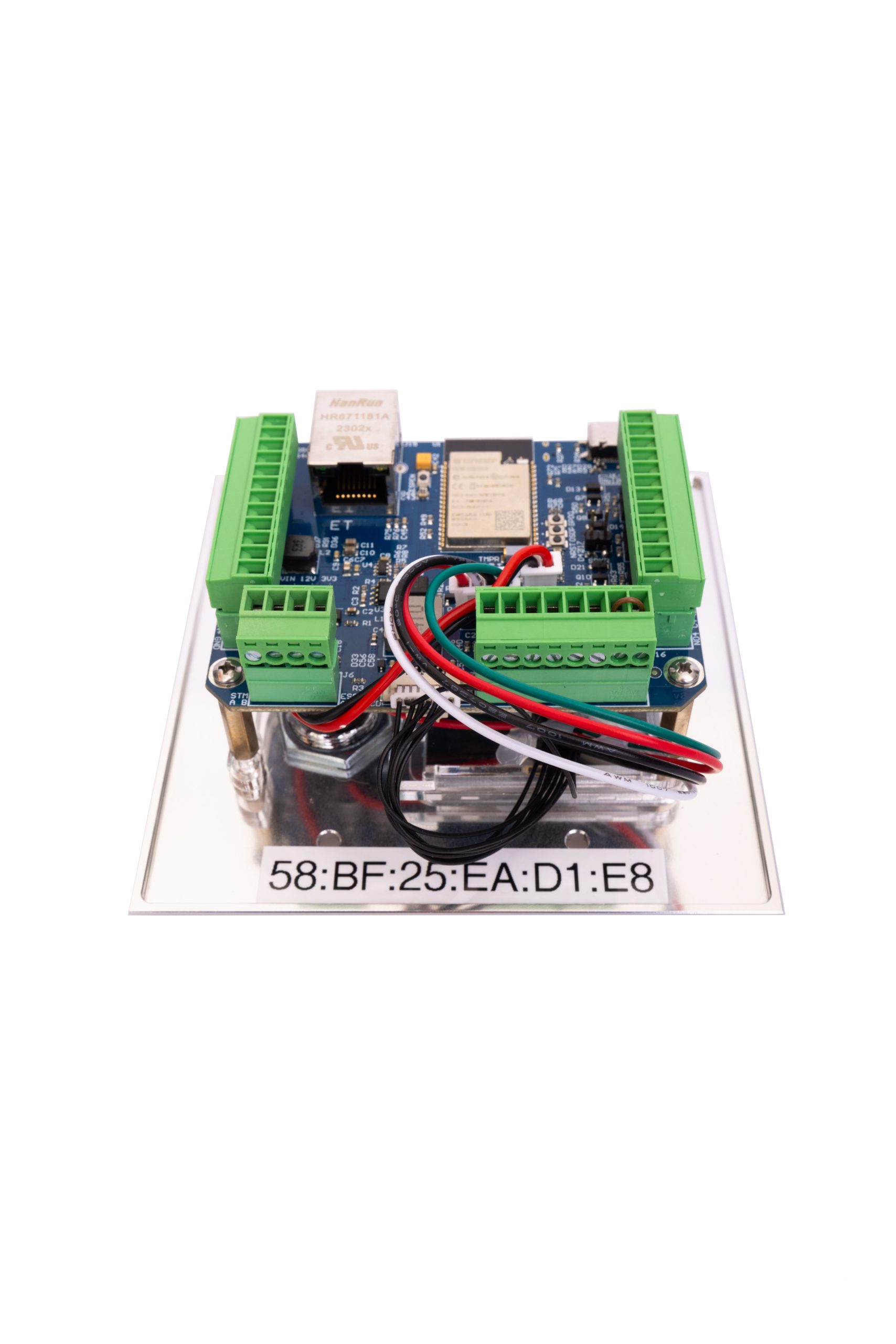 Top view of the iDMA9800 smart controller board with input/output terminals and MAC address label.